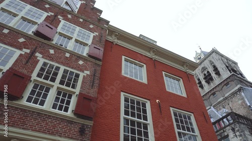 Details of Fascades on Central square of Delft City in Netherlands surrounded by old Dutch houses photo
