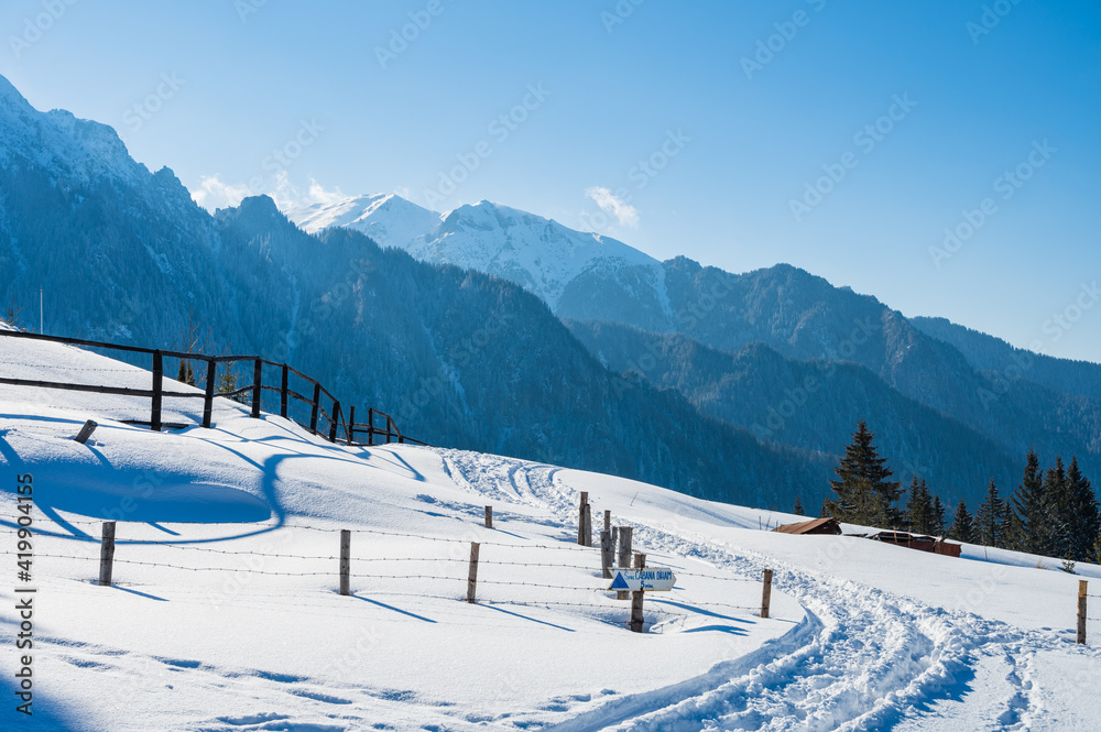 Snowy Romanian winter landscape of Bucegi mountains in the Carpathians