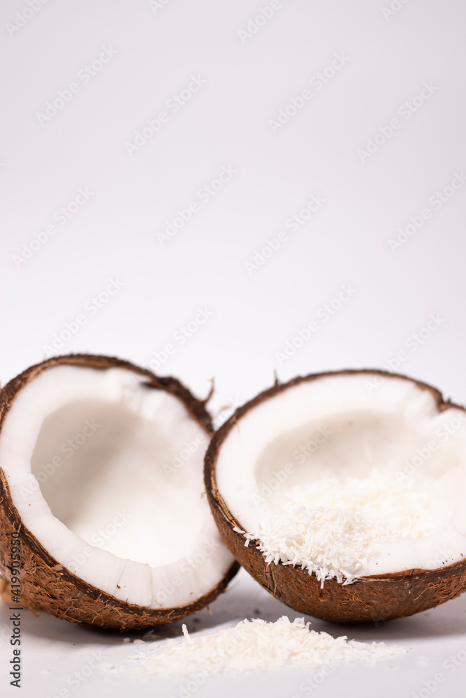 opened coconut with coconut flakes isolated on white background. tropical, nut opened coconut with coconut flakes isolated on white background. tropical, nut