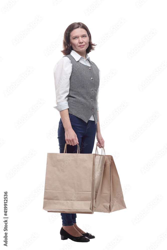 casual mature woman with shopping bags . isolated on a white casual mature woman with shopping bags . isolated on a white