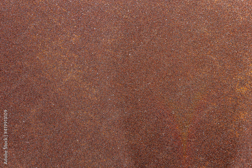 detail of a granular dark brown color detail of a granular dark brown color