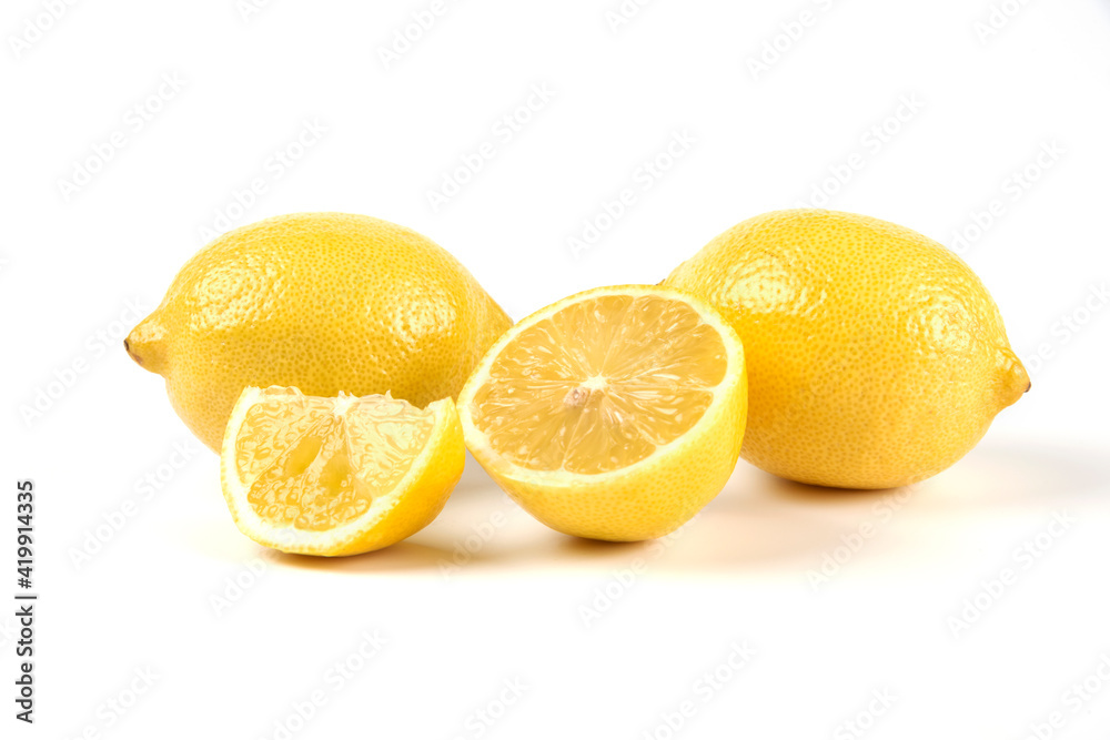 A slice and whole lemons isolated on white background A slice and whole lemons isolated on white background