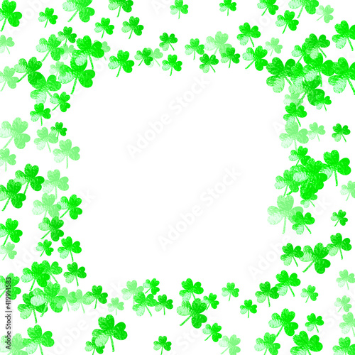 Saint patricks day background with shamrock. Lucky trefoil confetti. Glitter frame of clover leaves. Template for party invite, retail offer and ad. Festive saint patricks day backdrop.