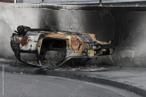 burnt car in the street 