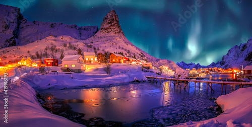 Wonderful winter scenery. popular touristic destination Reine. colorful night scene with Green northern lights above mountains Lofoten Islands. One of the most wonderfull nature sightseeing in Norway. © jenyateua