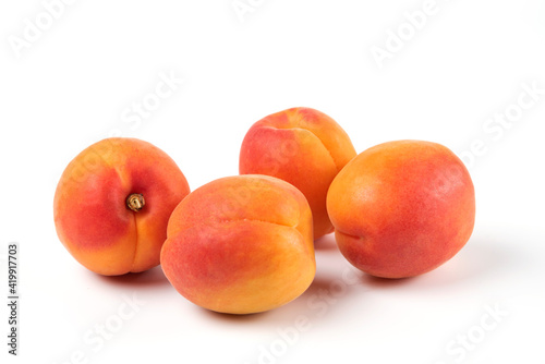 Four peaches isolated on white background zoom