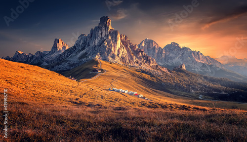 Scenic image of mountains during sunset. Amazing nature scenery of Dolomites Alps. Passo Giau popular travel destination in Dolomites. travel, adventure, concept image. Stunning natural background. © jenyateua