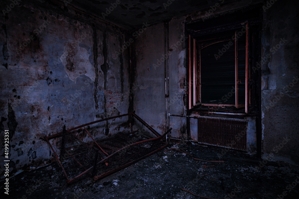 An old abandoned and burned out building An old abandoned and burned out building