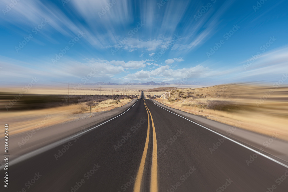 Empty desert highway with motion blur in the western Untied States. 
