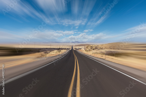 Empty desert highway with motion blur in the western Untied States. 