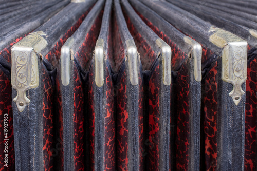 Slika na platnu Close-up view of the slightly open bellows of the bandoneon
