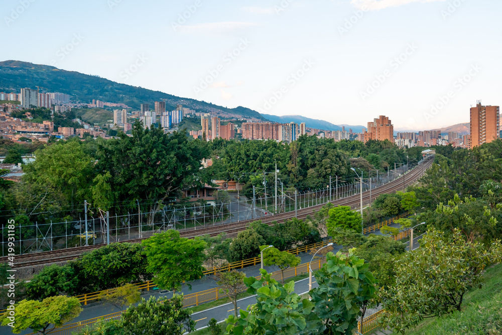 A Landscape of the Medellin City in the Afternoon Surrounded of Trees, Buildings, Mountains
