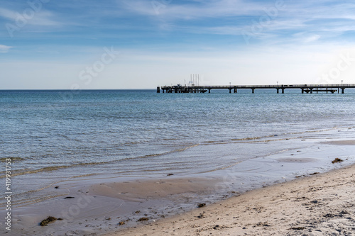 pier on the baltic sea on a sandy beach