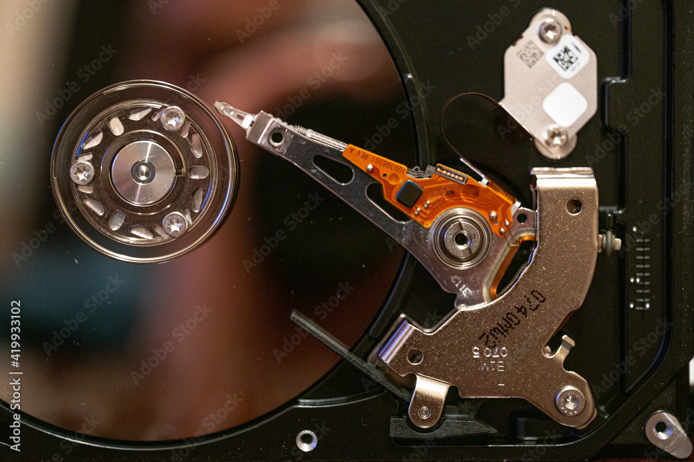 Computer Hard disk drives HDD , SSD on circuit board ,motherboard background. Close-up. Computer Hard disk drives HDD , SSD on circuit board ,motherboard background. Close-up.