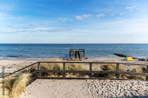 Fototapeta Naklejka Na Ścianę i Meble -  pier on the baltic sea on a sandy beach