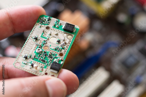 Close-up on electronic circuit with blurred background, very short depth of field