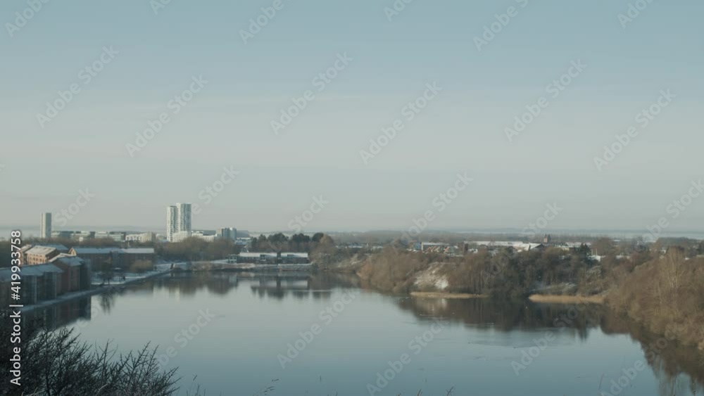 Lake In Winter With Skyscrapers Of City Beyond Lake In Winter With Skyscrapers Of City Beyond