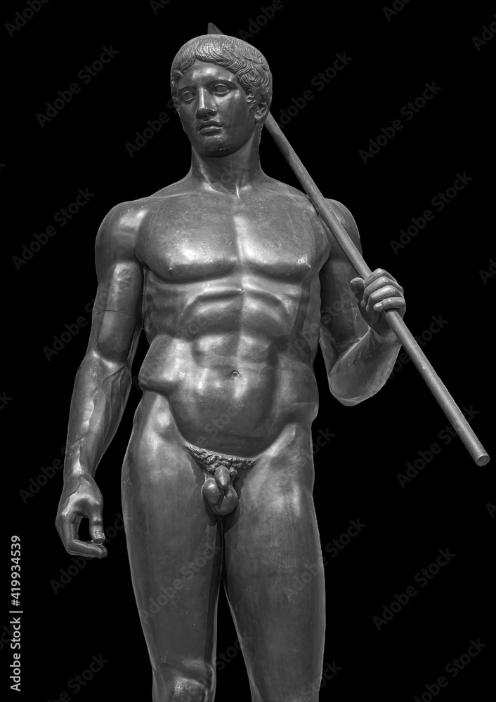 Ancient white marble full length sculpture of naked young man. Antique classic statue of youngster isolated on black. Stone figure of teenager Ancient white marble full length sculpture of naked young man. Antique classic statue of youngster isolated on black. Stone figure of teenager