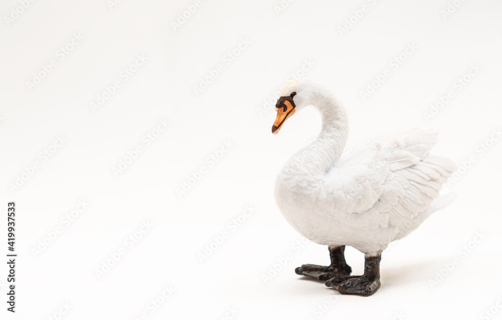 Naklejka premium Realistic plastic toy swan white. Cute little swan toy for kids. Isolate. Copy space