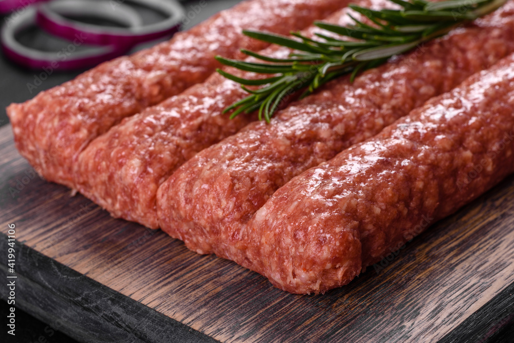 Fresh raw mince for grilled kebab with spices and herbs