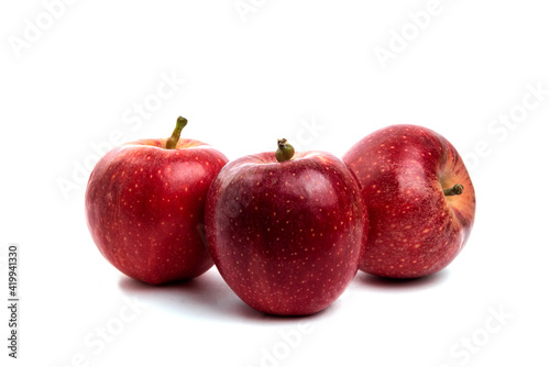 Delicious red apples isolated on white background