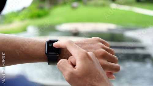 close up hand washing using smart watch : Bali Indonesia 12 March 2021 photo