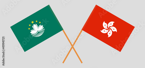 Crossed flags of Macau and Hong Kong. Official colors. Correct proportion