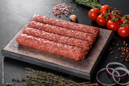 Fresh raw mince for grilled kebab with spices and herbs