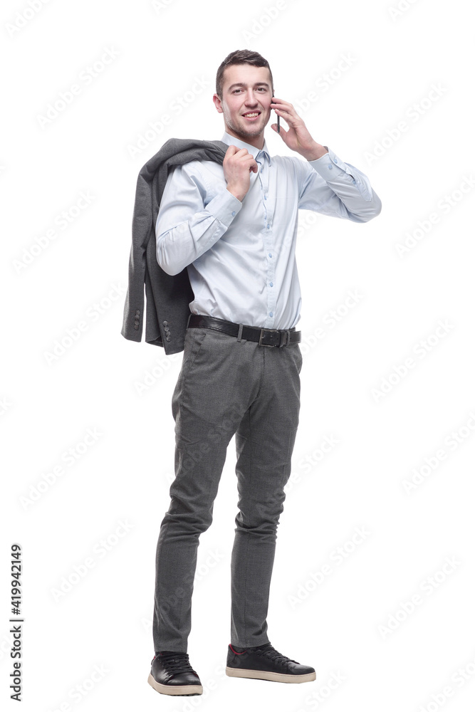 in full growth. smiling business man with a smartphone . in full growth. smiling business man with a smartphone .