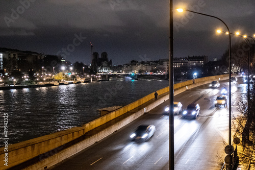 Traffic along the Seine in Paris at night