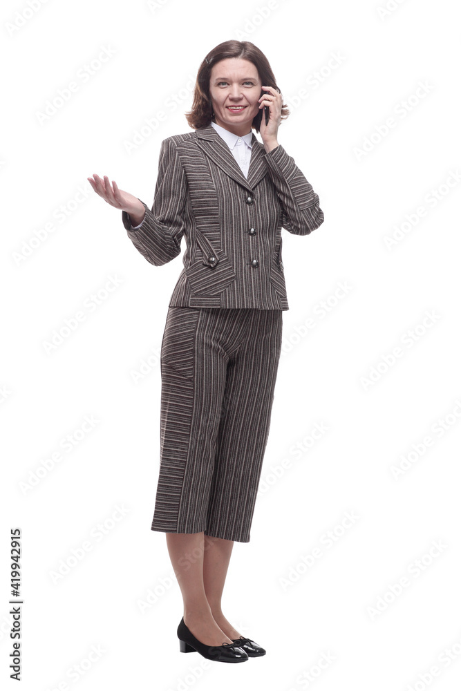 in full growth. modern business woman with a smartphone. in full growth. modern business woman with a smartphone.