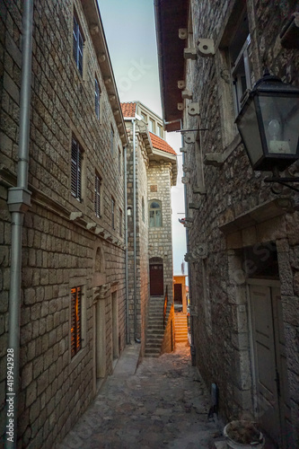 narrow alley of old town in balkan city © Patryk