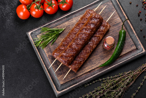 Fresh tasty kebab grilled with spices and herbs