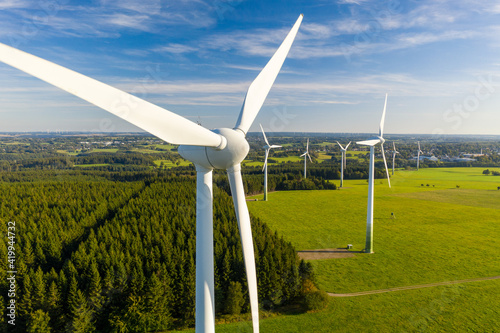 wind turbines in a field photo