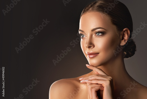 Beautiful young woman with clean fresh skin  .Girl  beauty face care. Facial  treatment   .