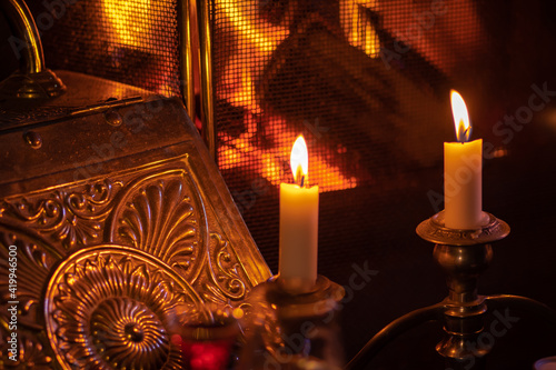 Fireplace, candles and romantic still life