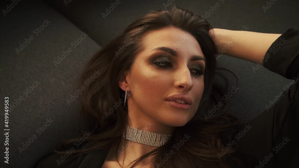beautiful brunette in the sunset at the hotel beautiful brunette in the sunset at the hotel