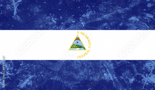 Grunge Nicaragua flag. Nicaragua flag with waving grunge texture. Vector background.