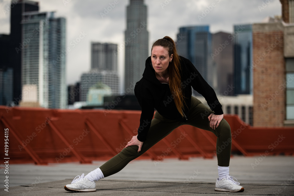 Young Athlete Warms Up on Los Angeles Rooftop Young Athlete Warms Up on Los Angeles Rooftop