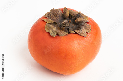 Ripe Persimmon On White Background
