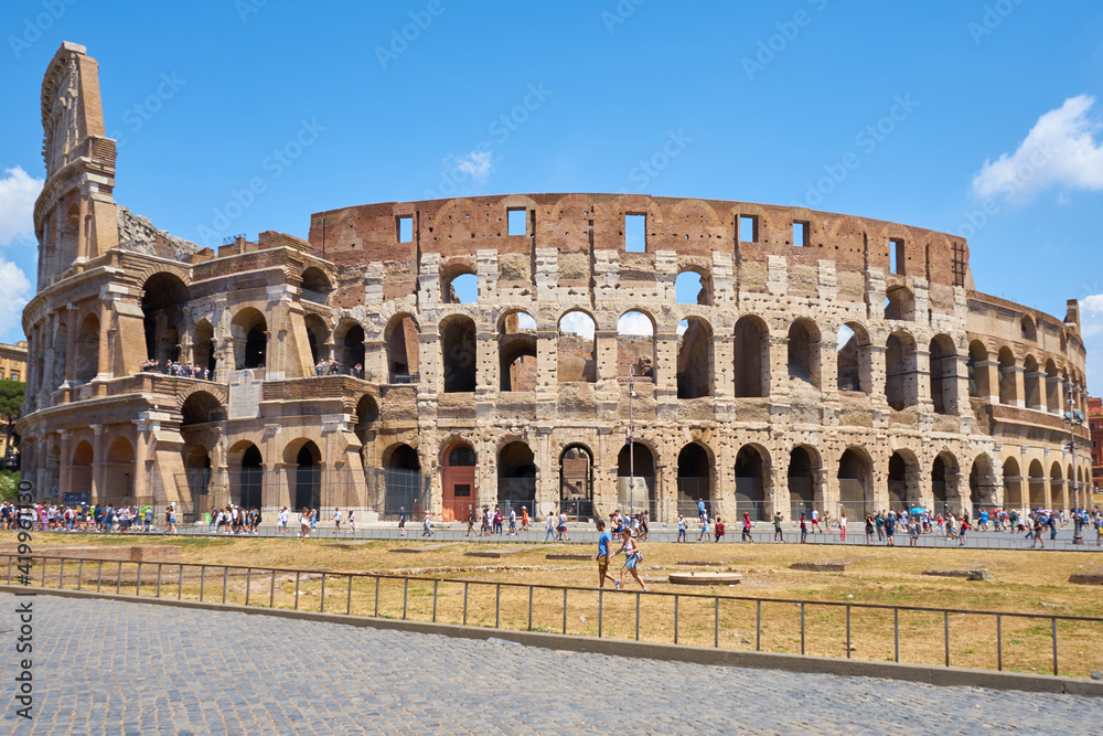 Colosseum or Coliseum in Rome, Italy. Ancient Roman Scenic view of Colosseum ruins in summer.