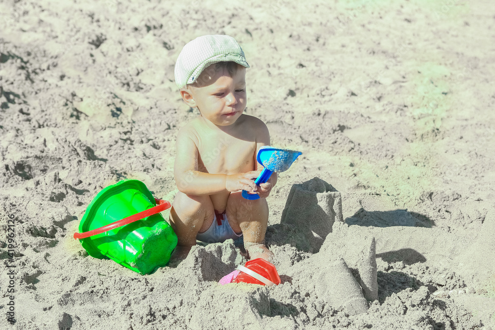 happy child playing by the sea outdoors happy child playing by the sea outdoors