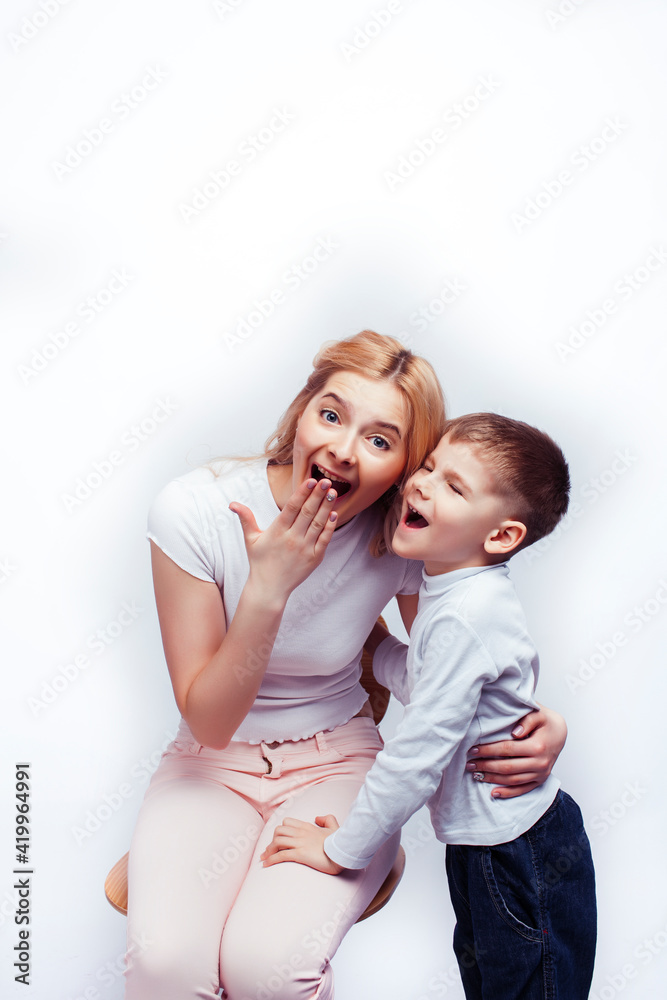 young modern blond curly mother with cute son together happy smiling family posing cheerful on white background, lifestyle people concept, sister and brother friends young modern blond curly mother with cute son together happy smiling family posing cheerful on white background, lifestyle people concept, sister and brother friends