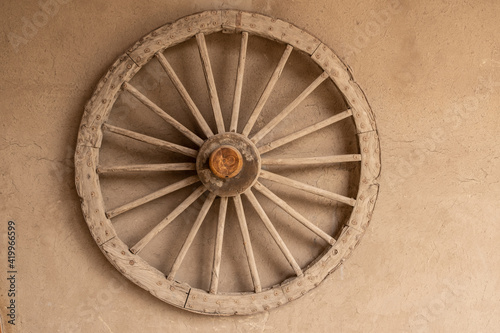 Wooden wheel model on the wall texture