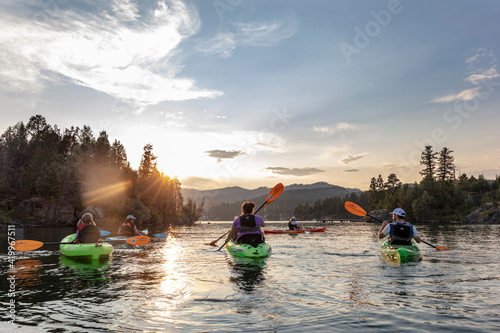 Принти на полотні Family sea kayaking on Flathead Lake in Somers, Montana, USA