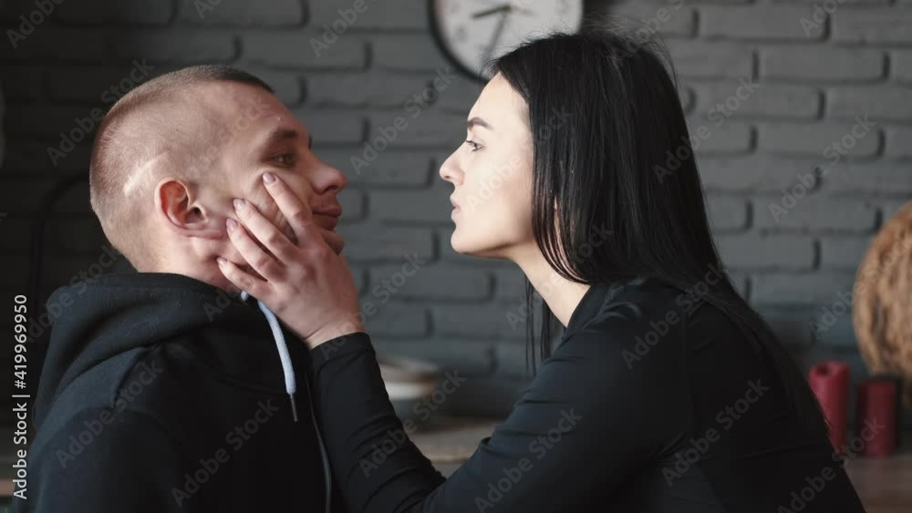 Young woman bullying her husband or boyfriends at home Young woman bullying her husband or boyfriends at home