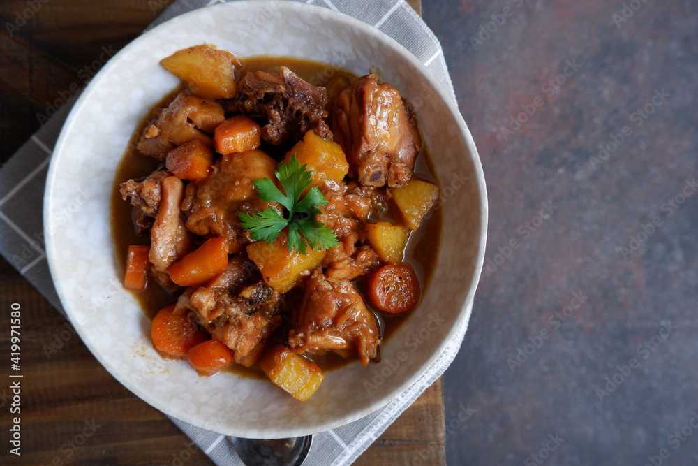 a bowl of chicken stew a bowl of chicken stew