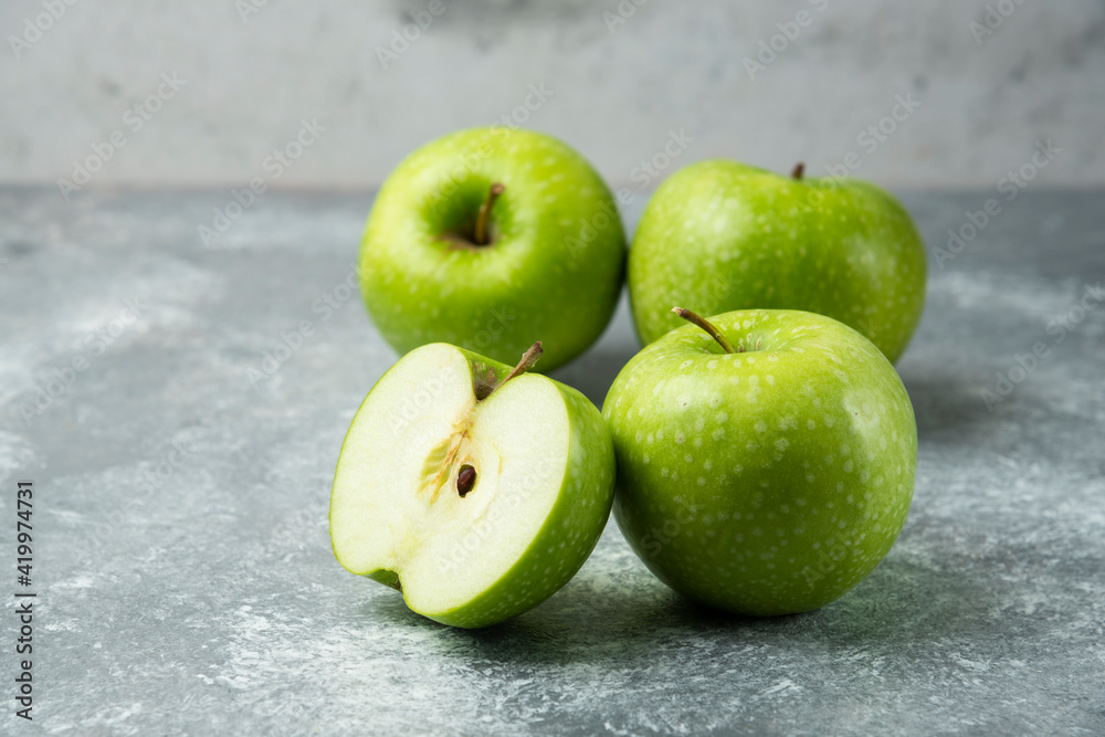 Bunch of green apples on marble background Bunch of green apples on marble background