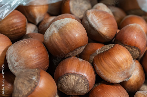 macro photo of natural hazelnuts close up