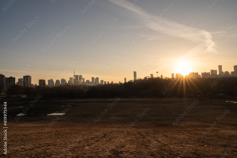 Toronto City Skyline at sunset from Riverdale Park in Ontario Canada